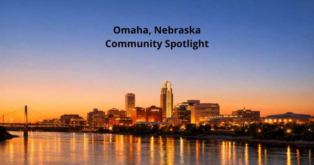 Omaha skyline glowing at sunset along the Missouri River